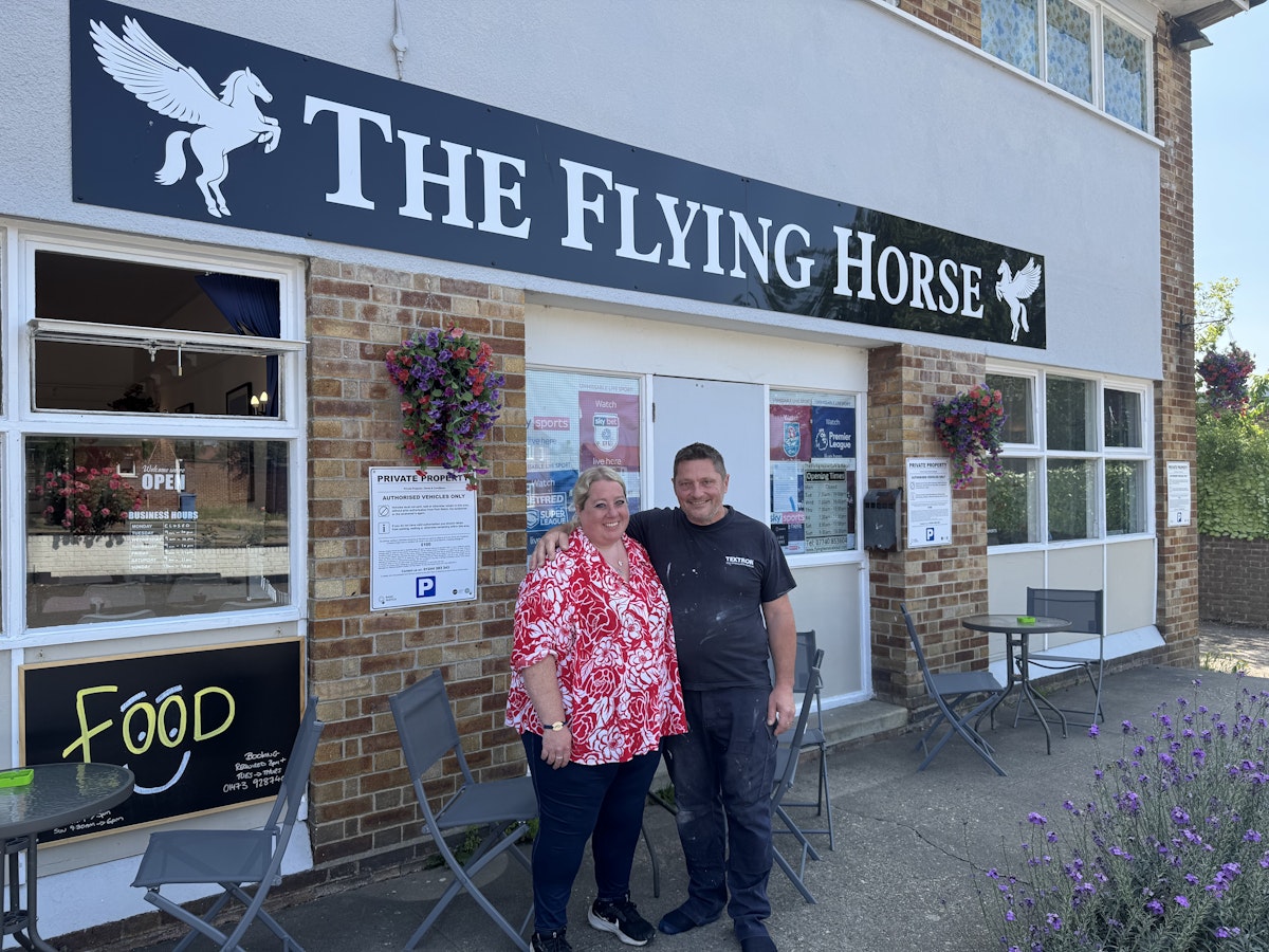 Owners Sarah and Guilio outside The Flying Horse in Ipswich
